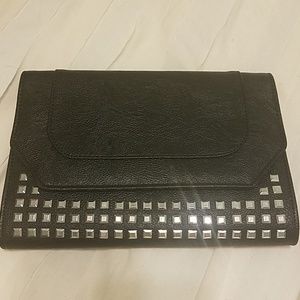 Black studded clutch